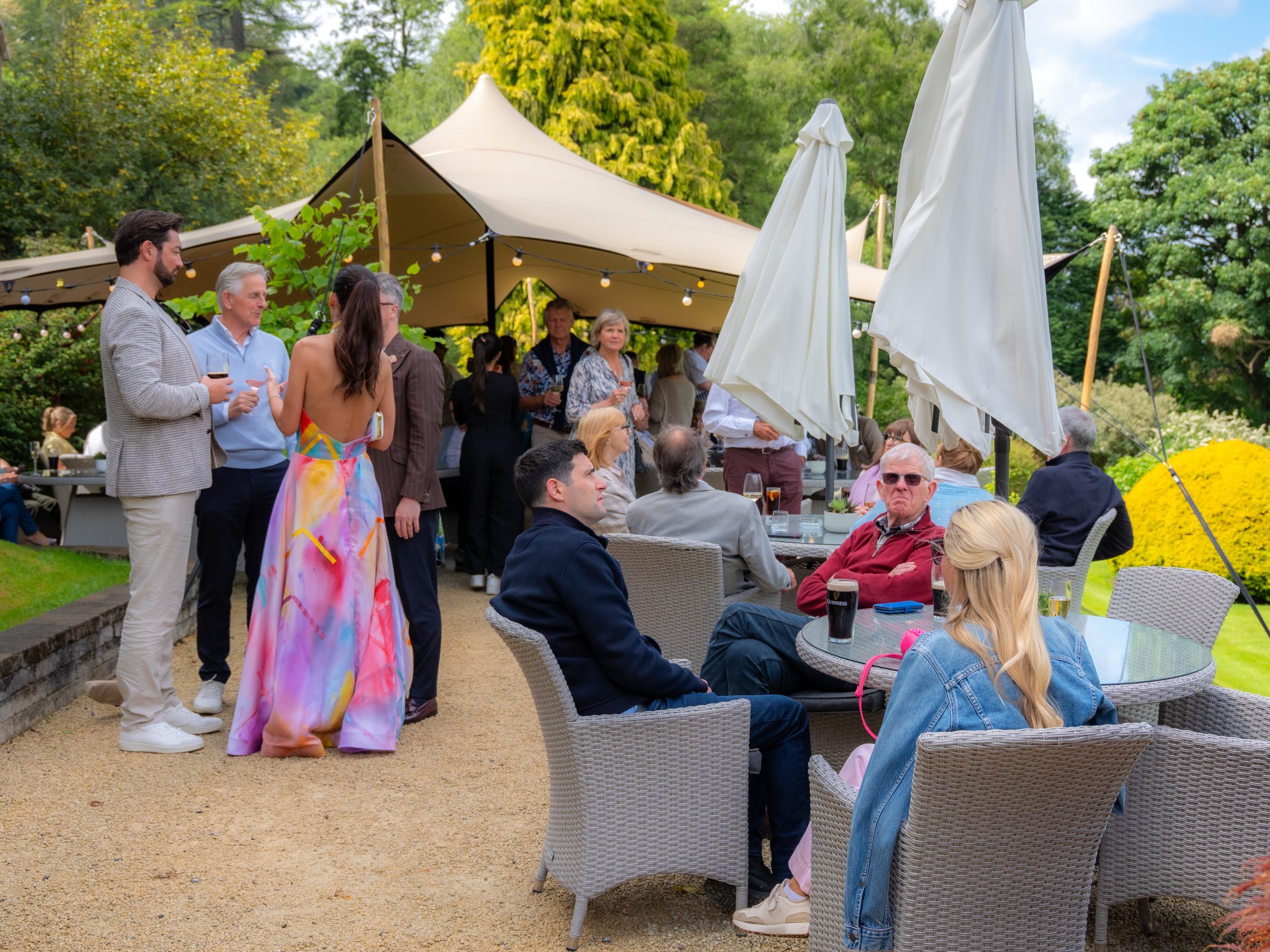 socialising in the garden at a multiple day wedding