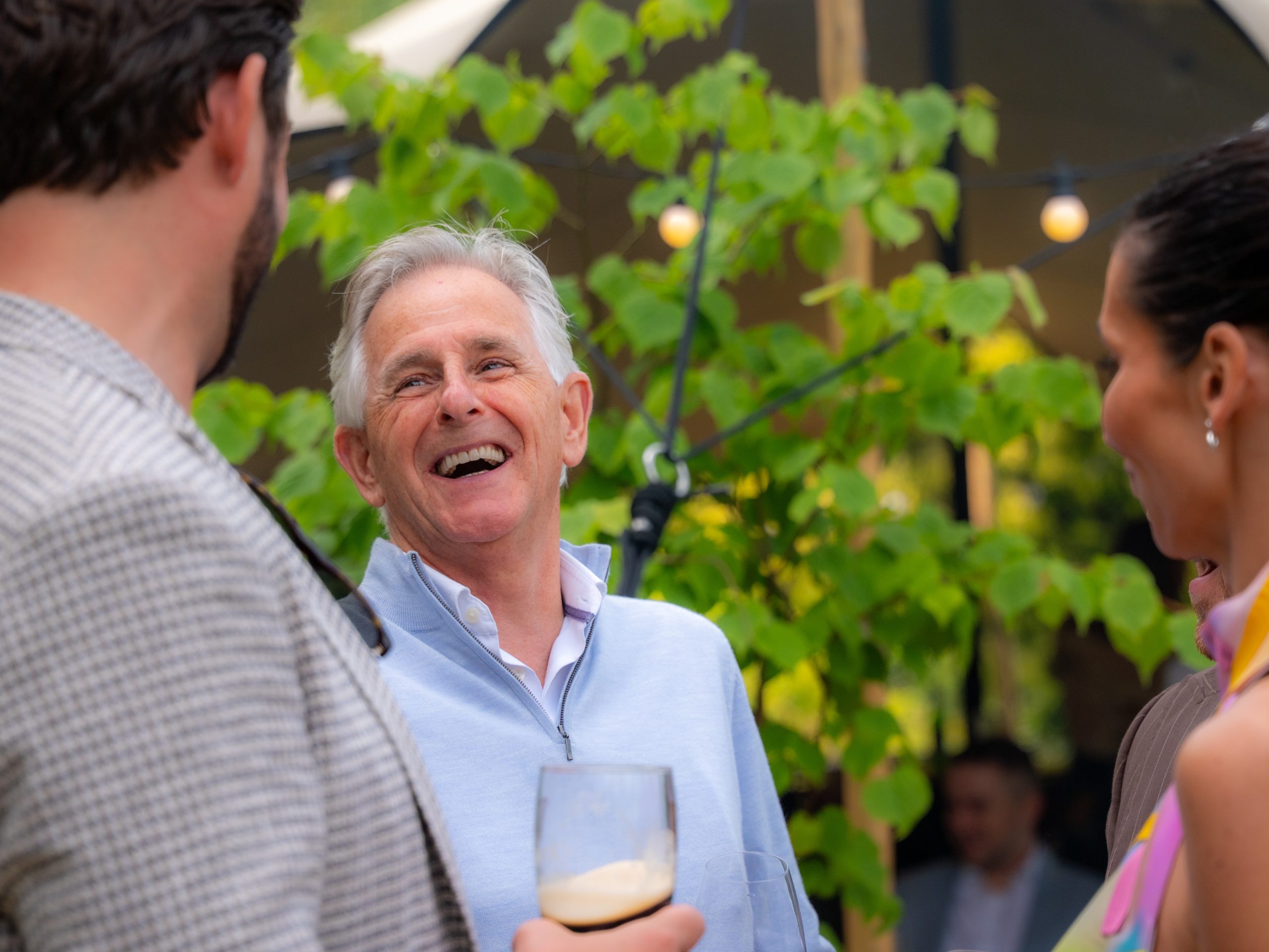 Multiple day wedding - guests enjoy a drink on the terrace