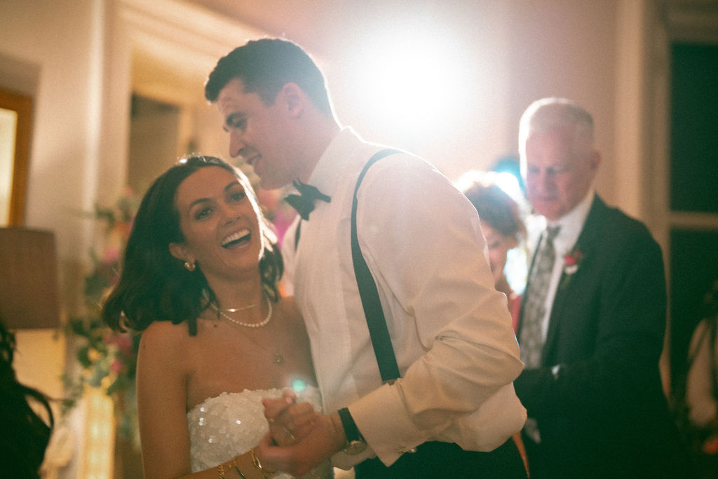 Guests dancing during ceilidh at Magheramorne Estate Drawing Room