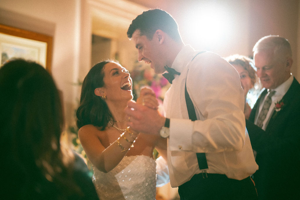Guests dancing during ceilidh at Magheramorne Estate Drawing Room